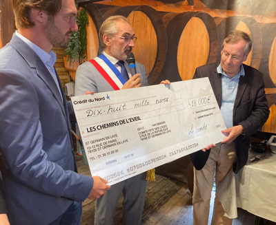 Chèque de 18 000€ remis à l'association Les Chemins de l'Eveil